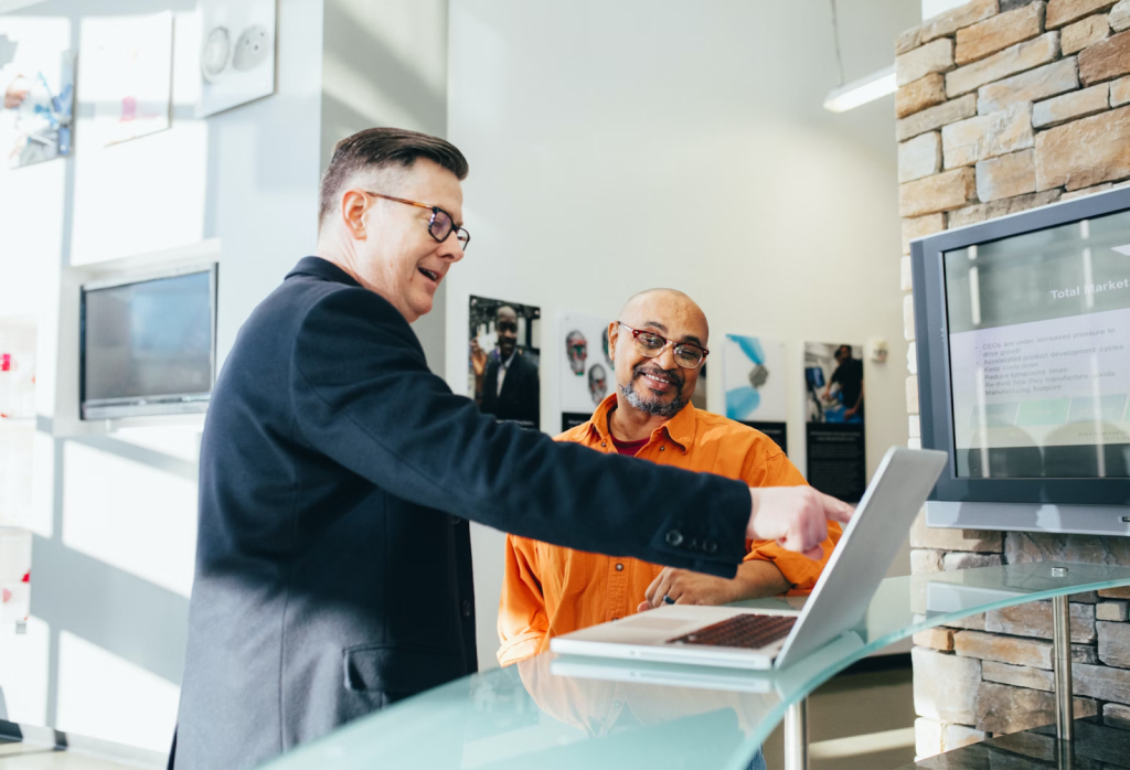 How To Boost Hiring Processes For Better Outcomes 3 unknown person using laptop