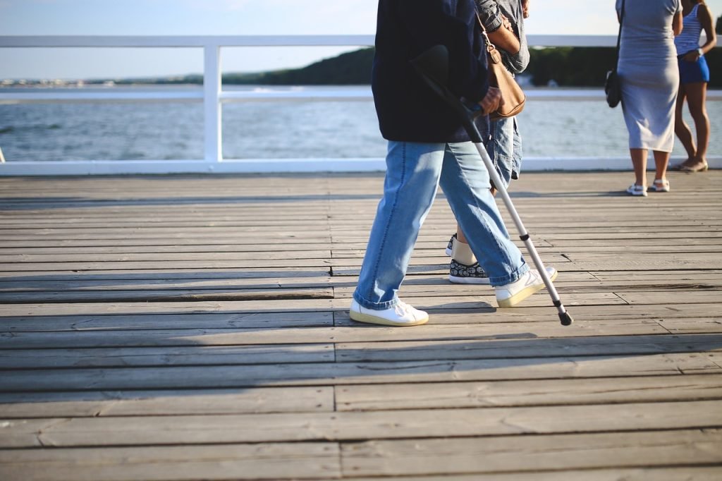 Work Injuries: Proven Ways To Legally Protect Your Rights 3 Woman, Crutch, Old image