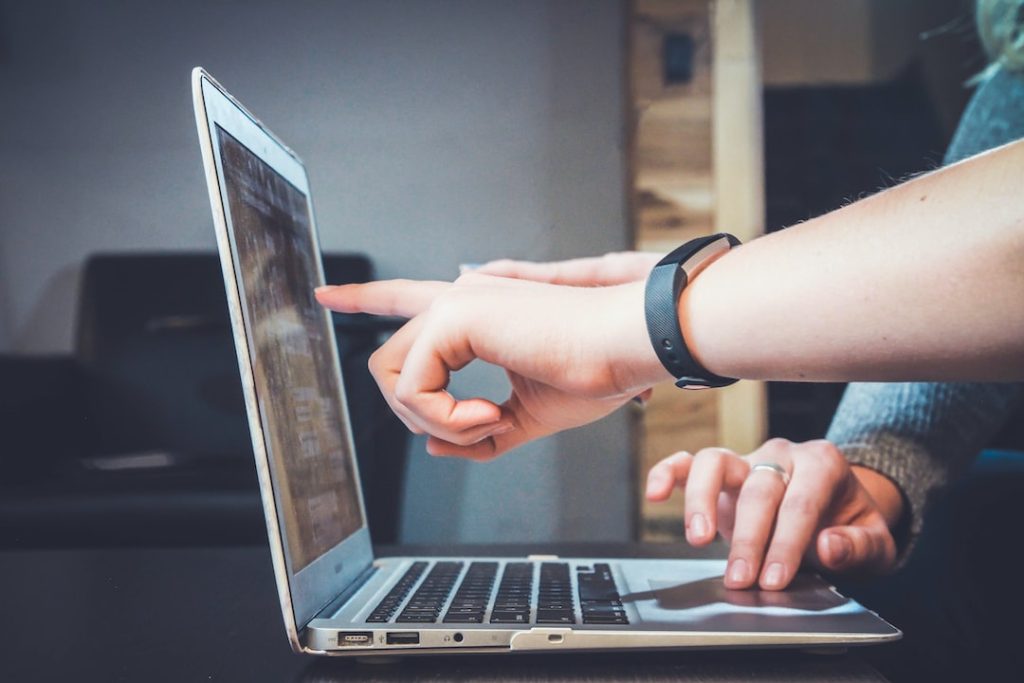 How To Create An Effective Church Website 1 person using laptop