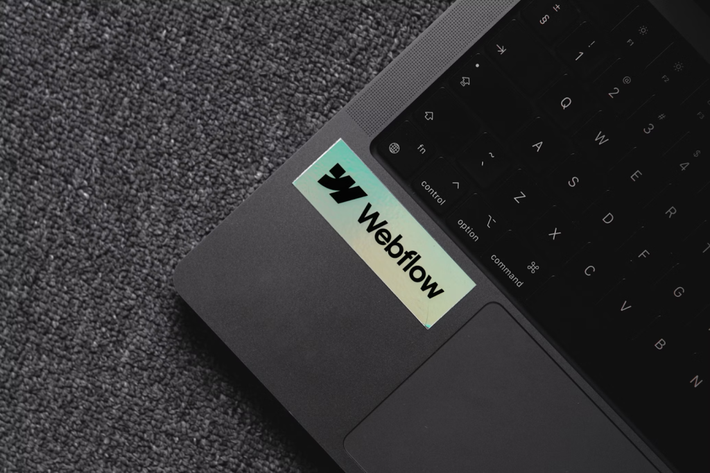 6 Reasons Why Webflow Is The Perfect Platform For Your Business 3 a laptop with a window sticker on the keyboard
