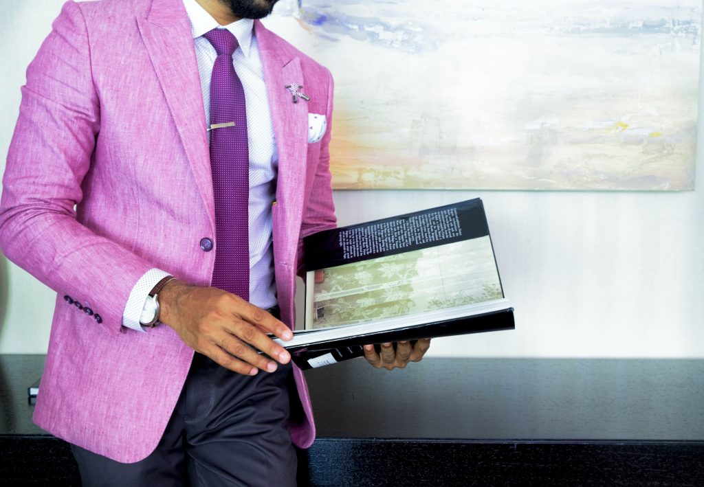 6 Useful Apps Every Serious Business Owner Needs To Use 1 Man reading magazine