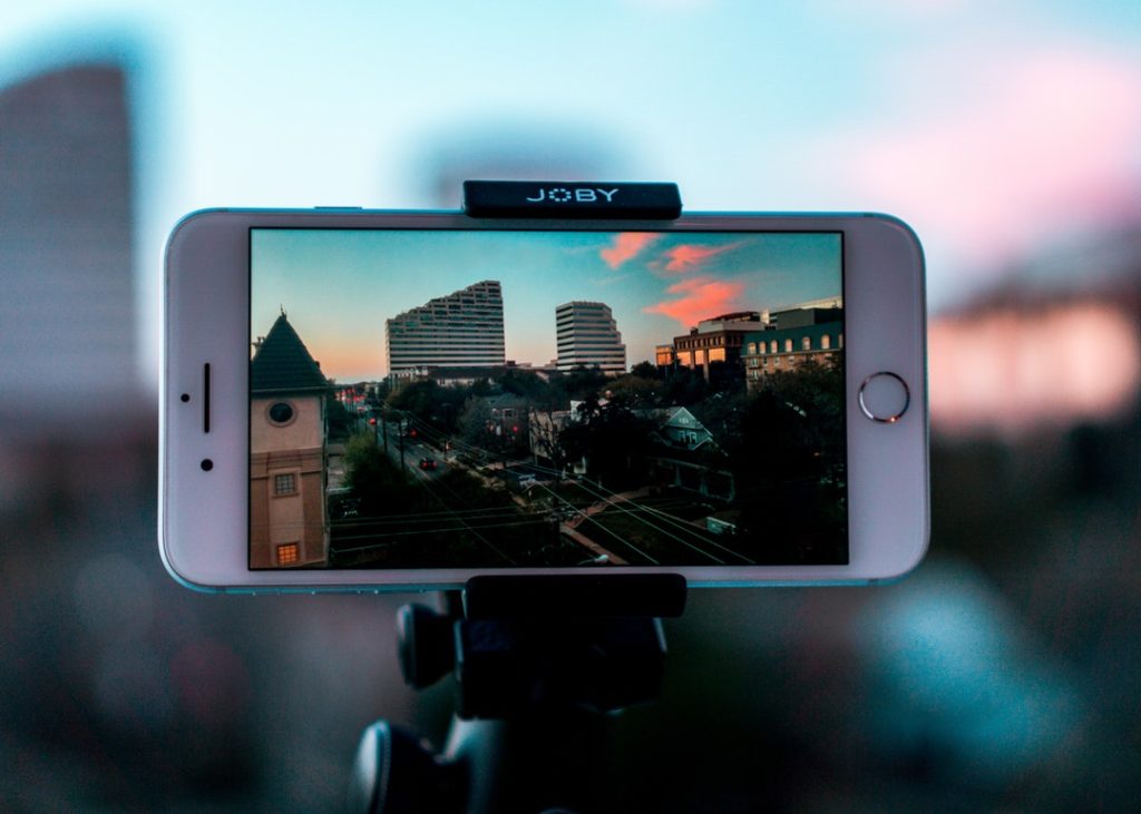 Video Marketing 101: A Beginner'S Guide To Creating Engaging Content 3 iPhone showing building