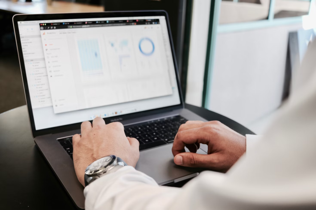 Why Data Literacy Matters More Than Ever? 3 person using MacBook Pro