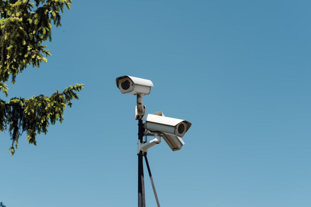 Why Professional Guard Services Are Essential For Your Business 3 white and black camera on tripod