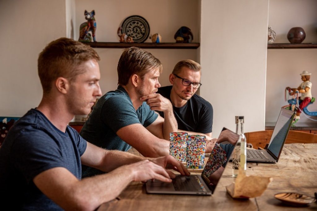 Building A Unique Identity For Your Indie Game: Key Lessons 3 man in blue crew neck t-shirt sitting beside woman in black tank top