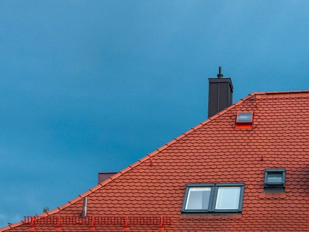 Beyond Curb Appeal: How Roof Quality Shapes Buyer Decisions 3 red brick roof