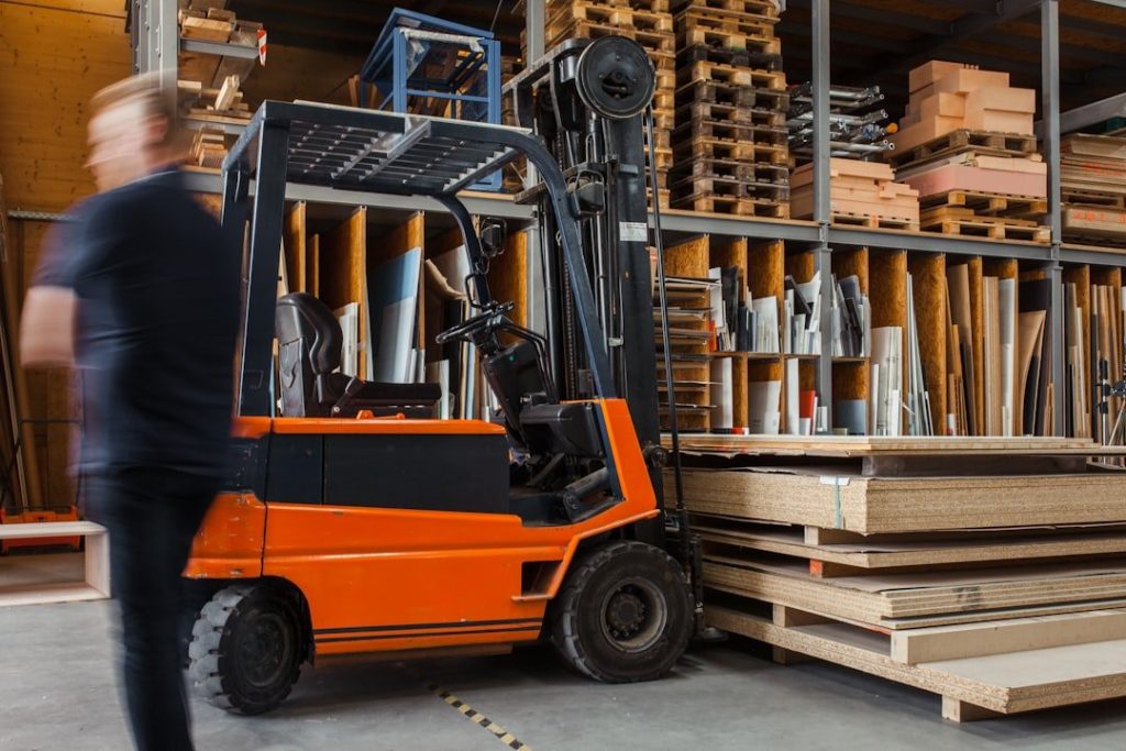 How To Develop A Material Handling System That Supports Business Growth And Expansion 3 yellow and black fork lift
