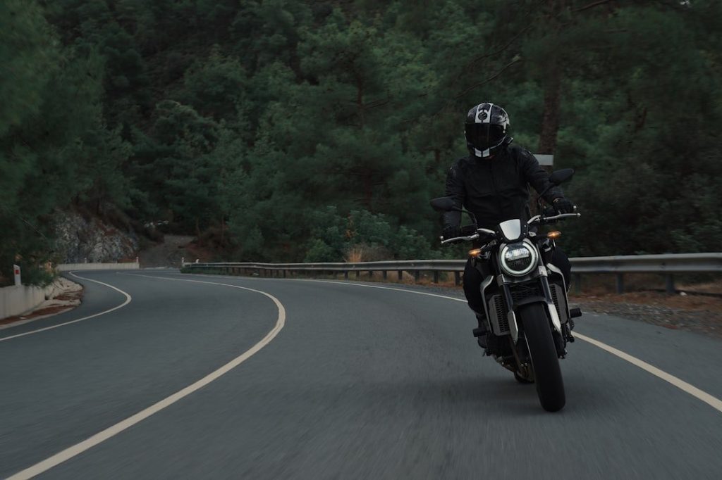 Managing Time And Efficiency Post-Motorcycle Accidents 1 man riding motorcycle on concrete street