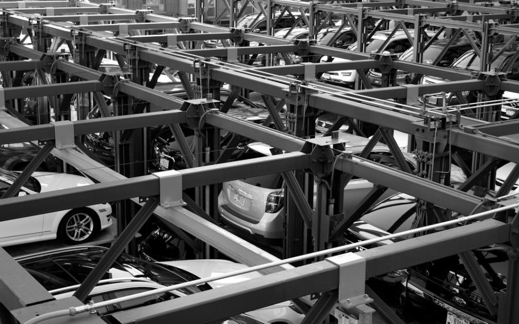 Car Storage Options For Collectors: Keeping Your Collection Safe 1 grayscale photography of cars