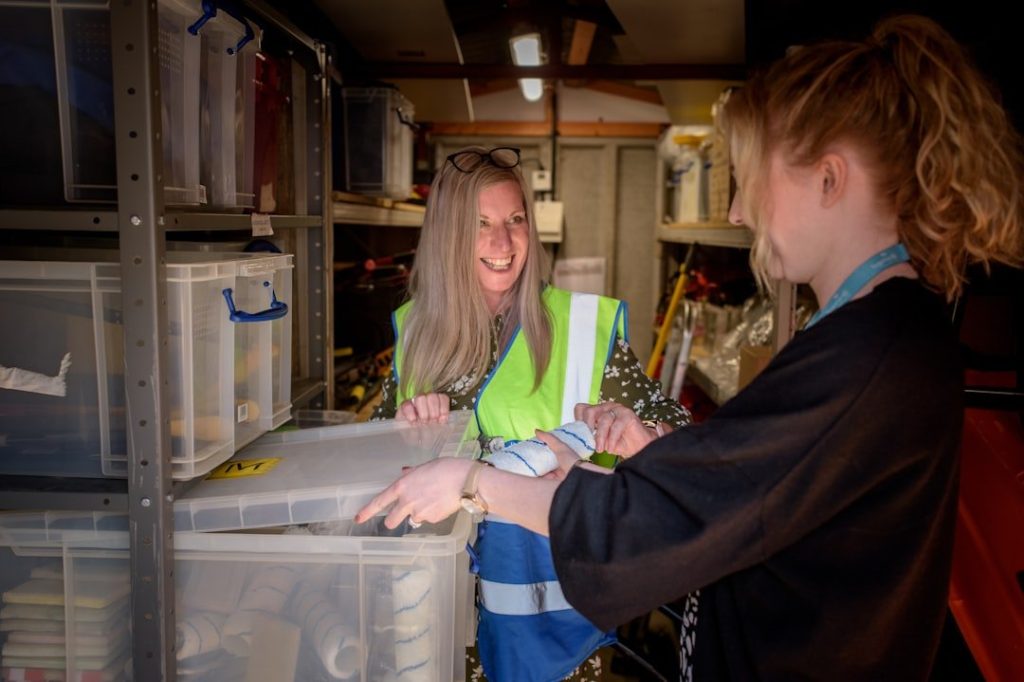 Picking The Right General Labor Workers: What To Look For 1 women looking at a file