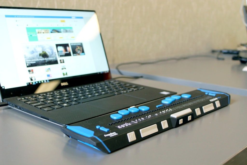 Why Accessibility Must Be A Core Part Of Every Digital Platform 1 a laptop computer sitting on top of a desk